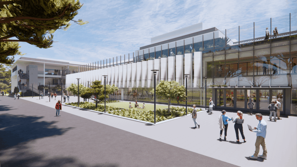 Architectural rendering of a modern campus building with a glass facade, a central courtyard with trees and grass, and people walking on a wide outdoor plaza.
